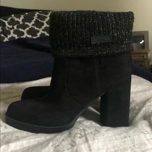 New black booties with detail around cuffs